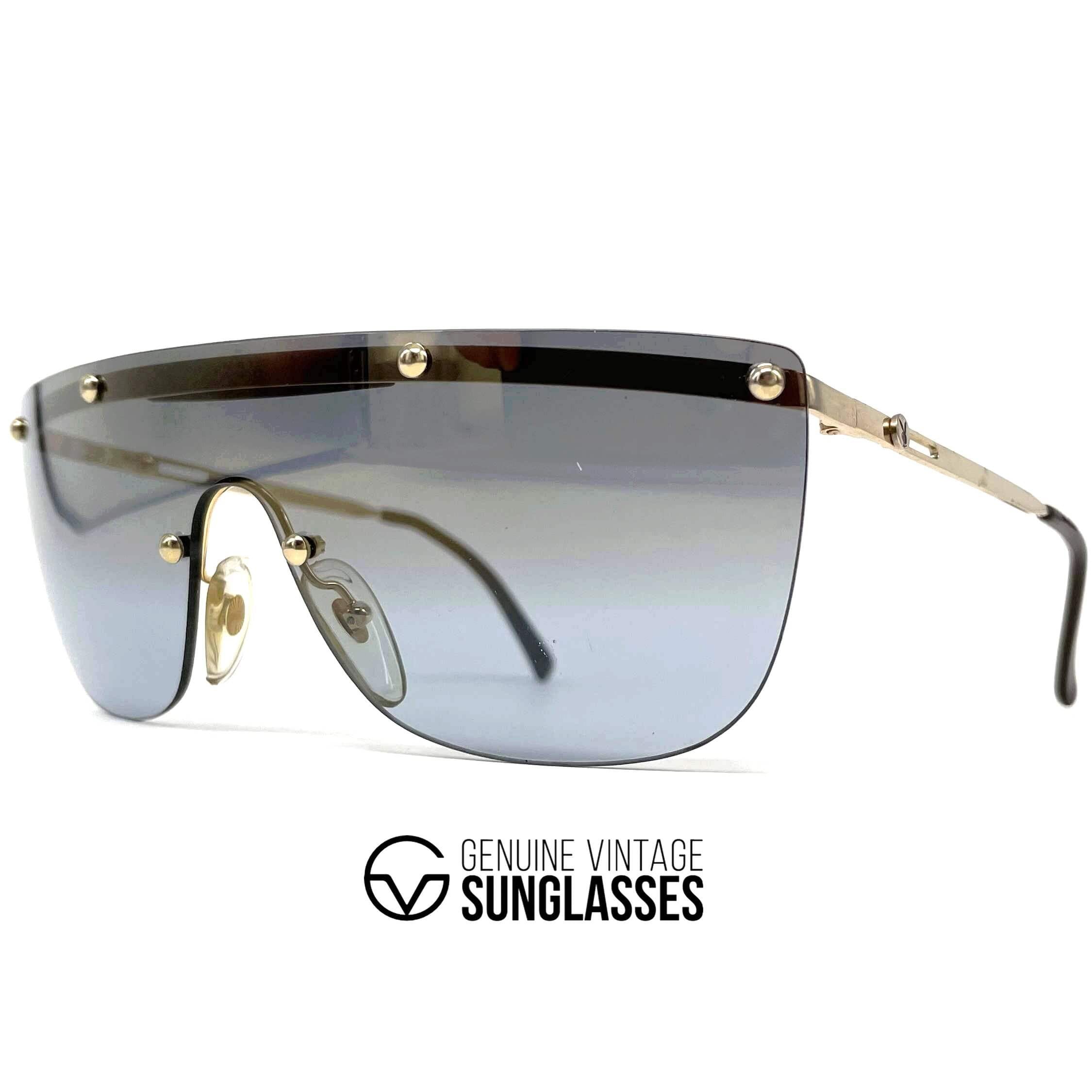 Vintage PLAYBOY 4674 gold rimless shield sunglasses