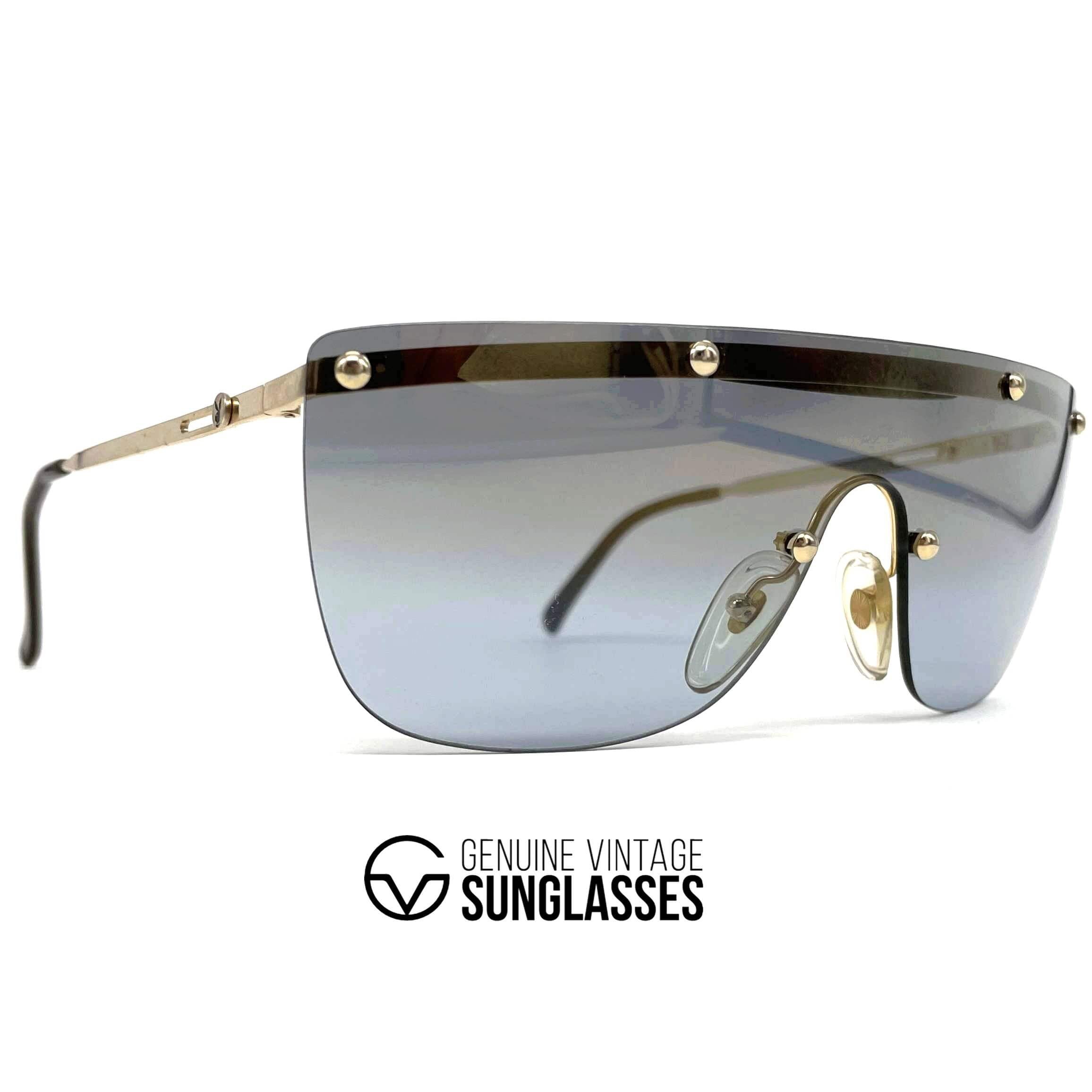 Vintage PLAYBOY 4674 gold rimless shield sunglasses