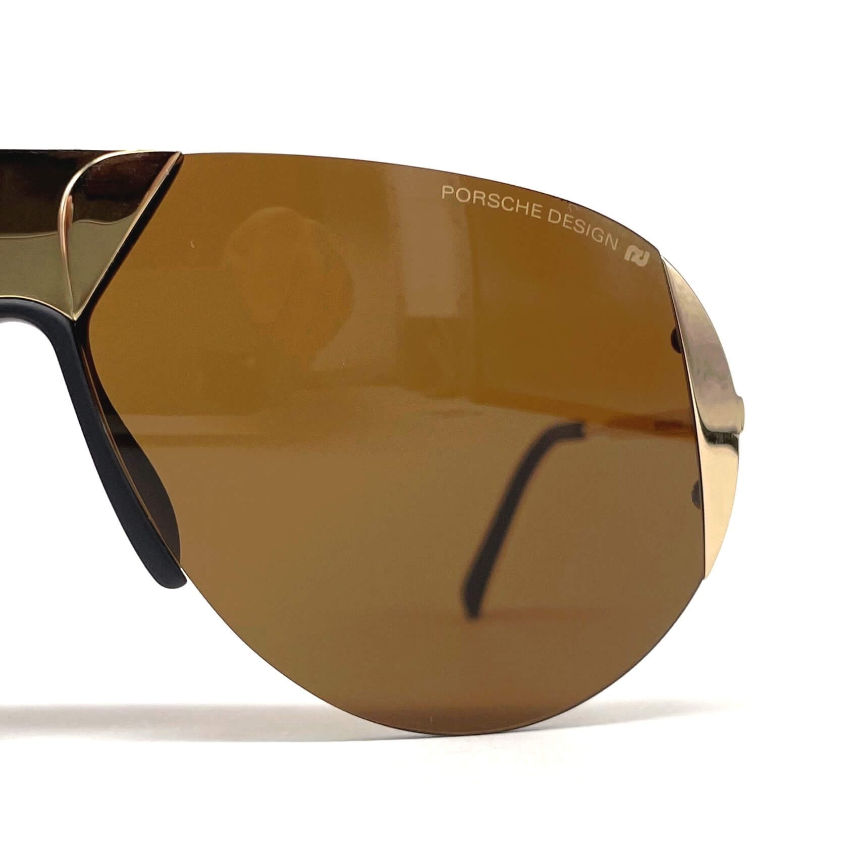 Vintage PORSCHE DESIGN by CARRERA 5636 gold rimless designer sunglasses